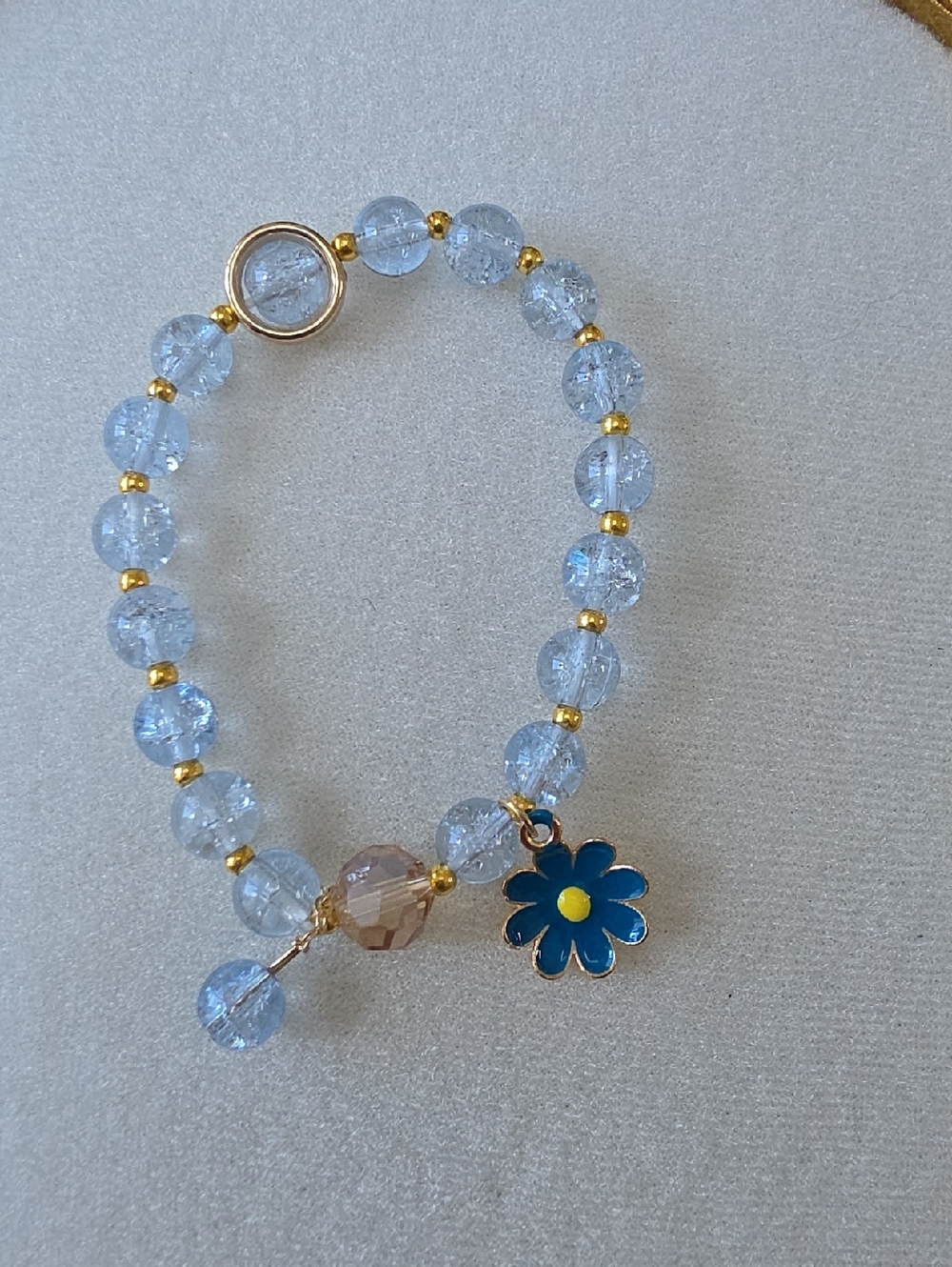 Blue Crackle Bead Bracelet with Gold Accents & Blue Daisy Charm